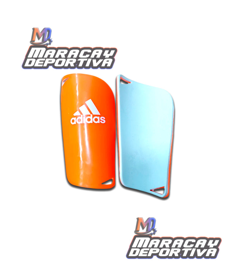 Canilleras Nike y Adidas