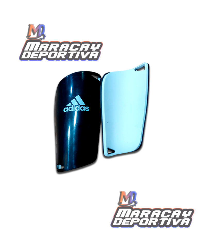 Canilleras Nike y Adidas
